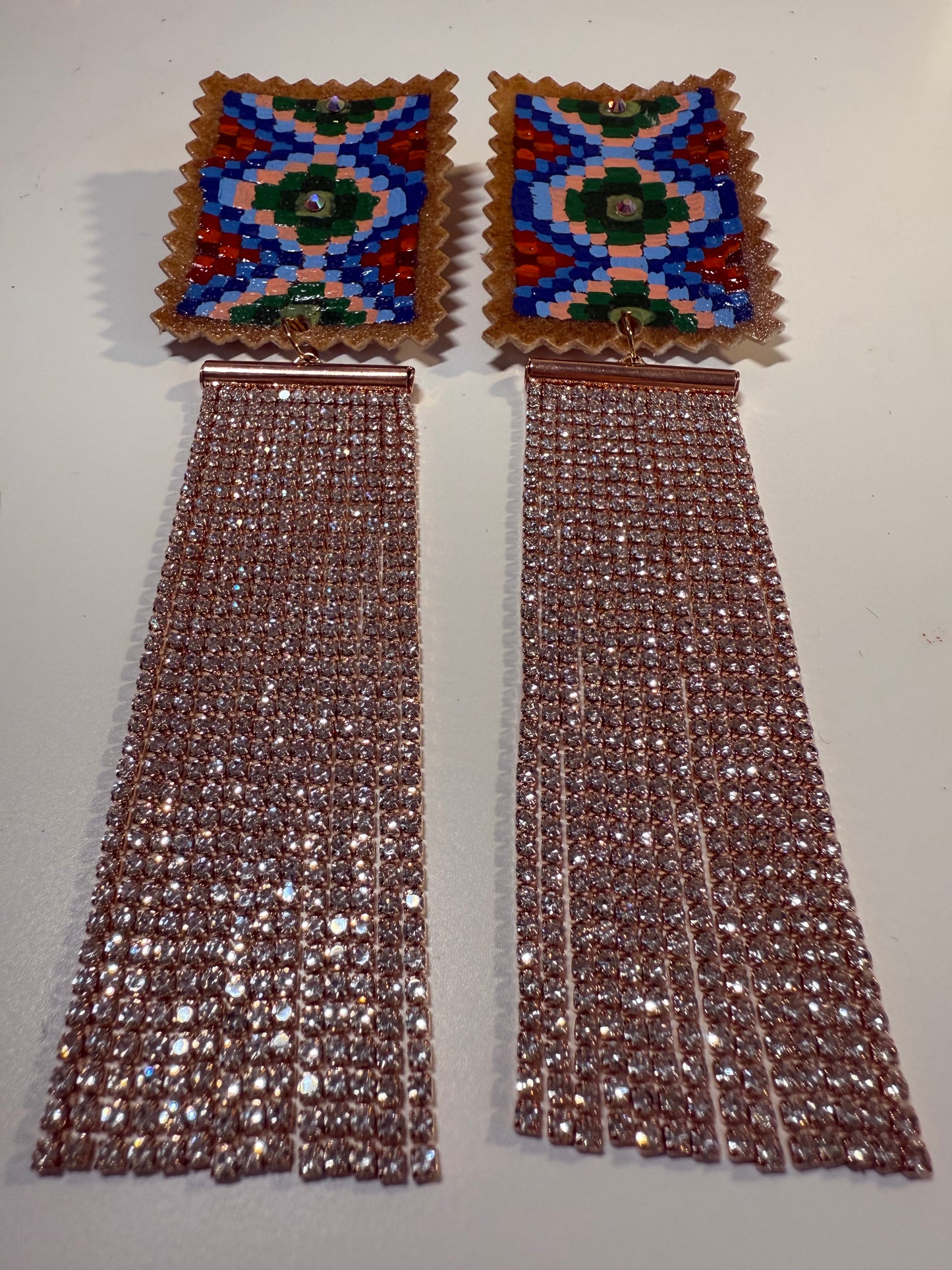Hand painted earrings with gem drops.