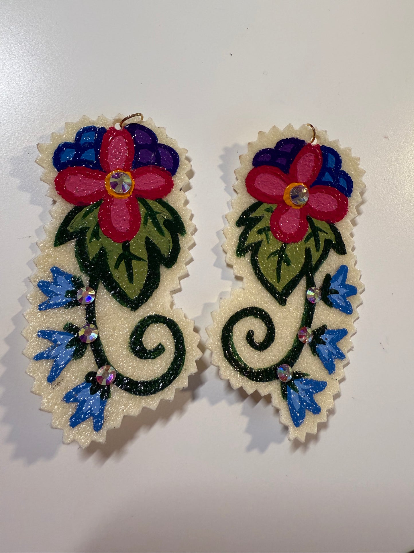 Hand painted earrings.