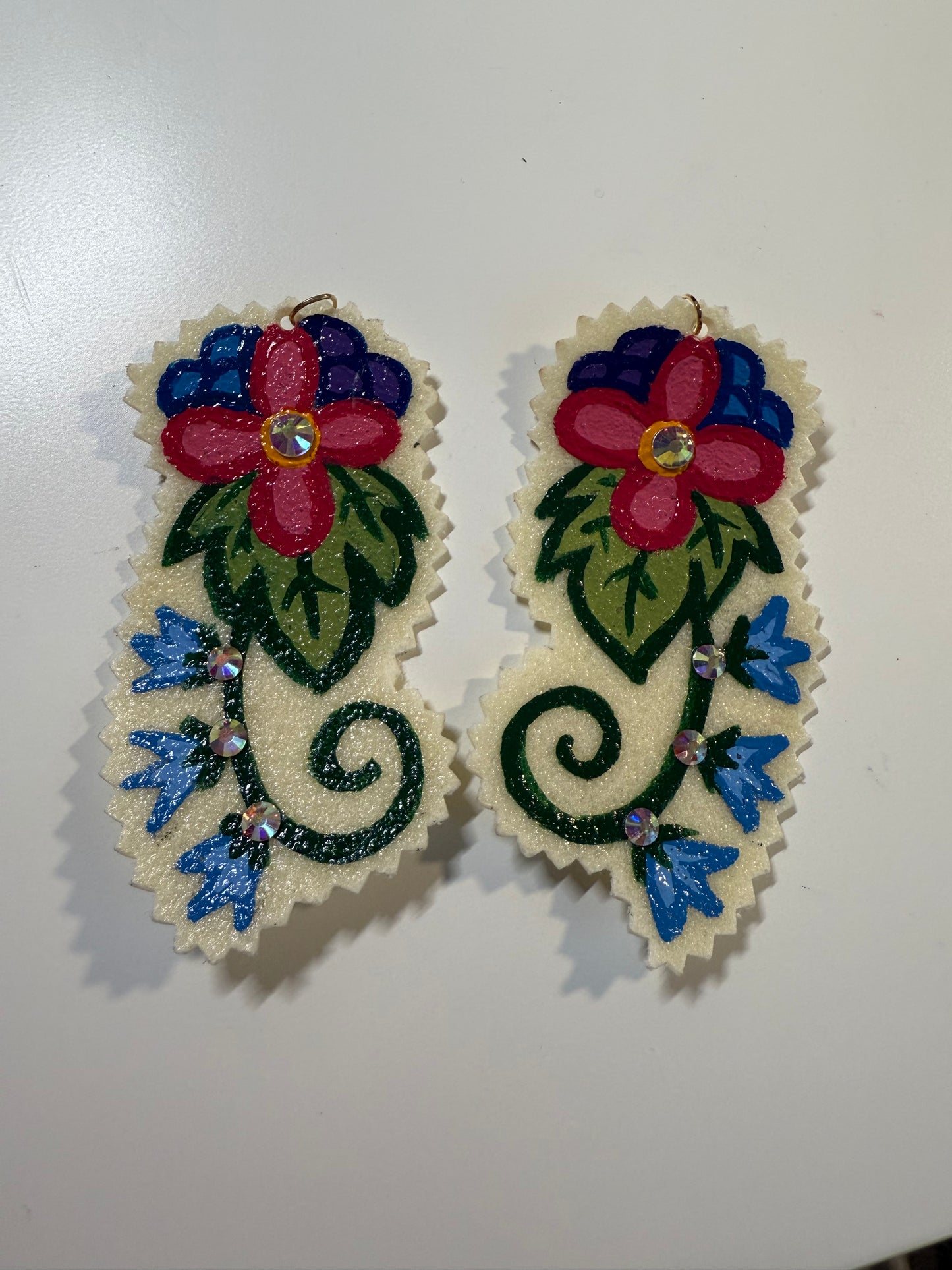 Hand painted earrings.